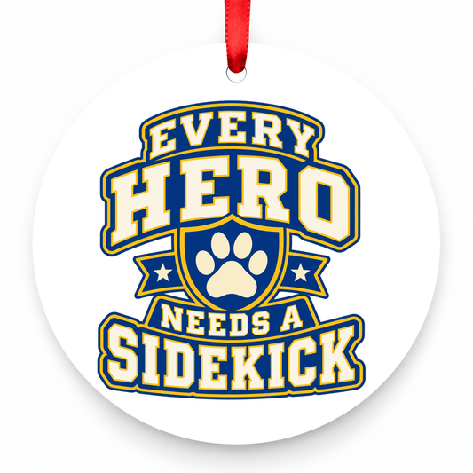 Every Hero Needs a Sidekick Christmas Ornament with red hanging ribbon