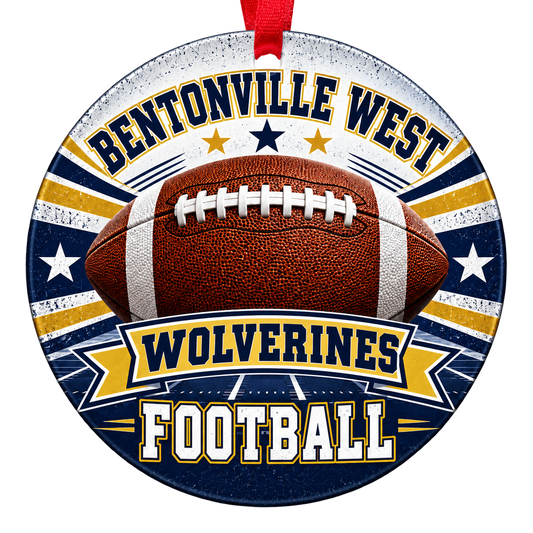 Bentonville West Wolverines Football ornament, football, stars and field artwork, navy and gold, red hanging ribbon.