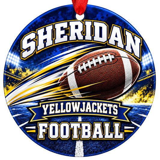 Sheridan Yellowjackets Football Christmas ornament with football with motion streaks and stadium lights in blue and gold, red hanging ribbon.
