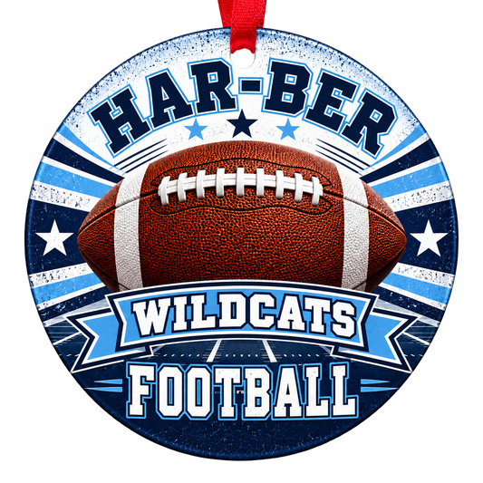 Har-Ber Wildcats Football Christmas ornament with football, stars and field artwork in navy blue and Carolina blue, red hanging ribbon.
