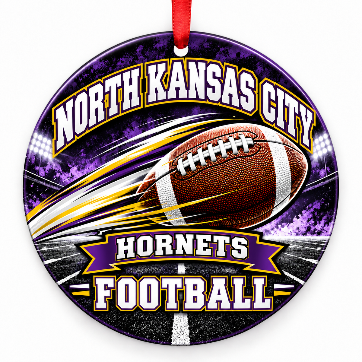 North Kansas City High School Hornets Football Christmas ornament — Football in Motion — purple and gold with red ribbon